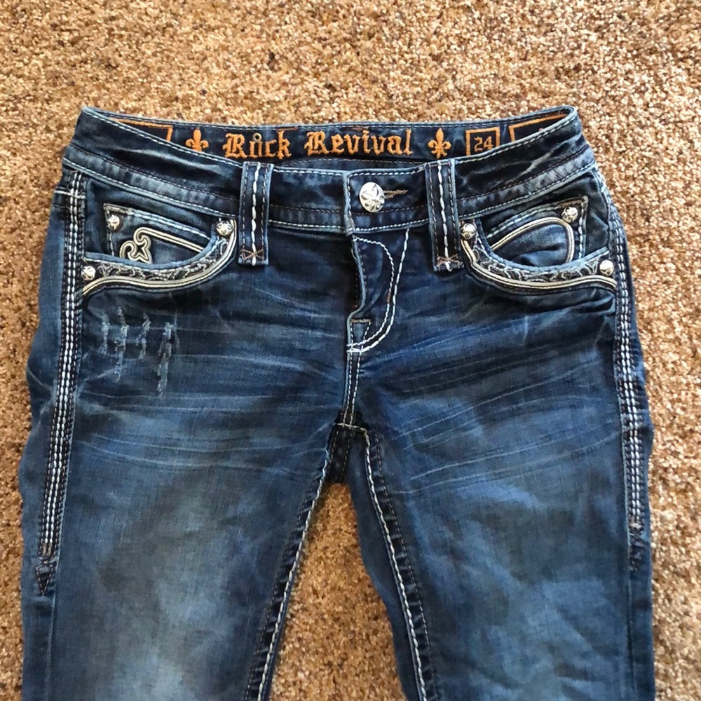 lightly worn rock revival boot cut jeans!